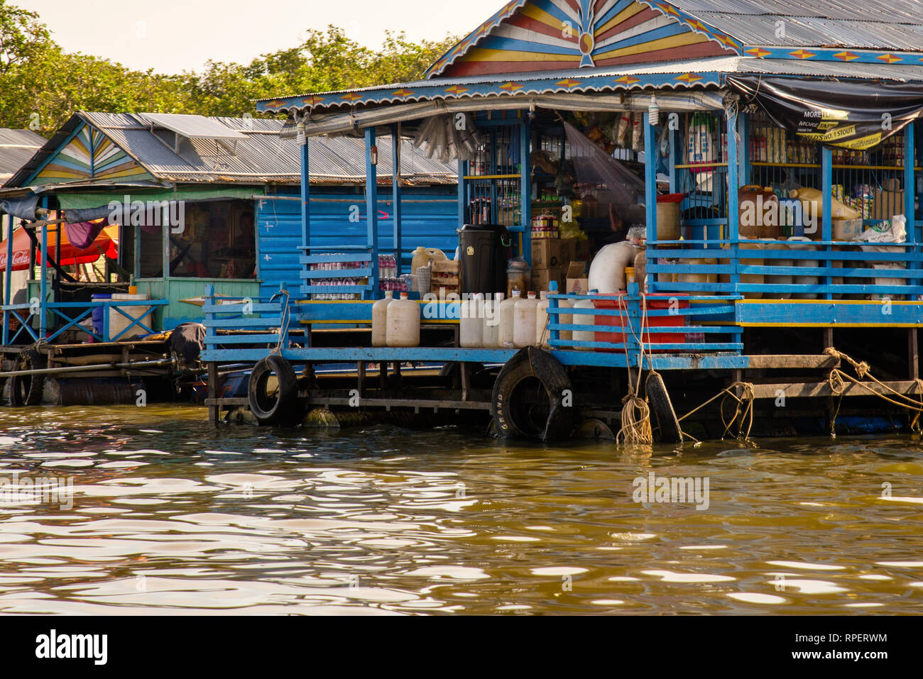 Vernacular architecture of the floating village of Chong Khneas on Tonle Sap Lake in Cambodia. Stock Photo