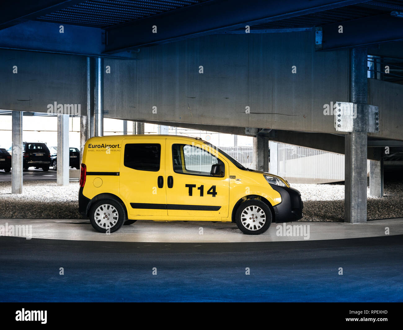 BASEL, SWITZERLAND - MAR 22, 2018: EuroAirport yellow service FIAT van  inside modern parking Stock Photo - Alamy
