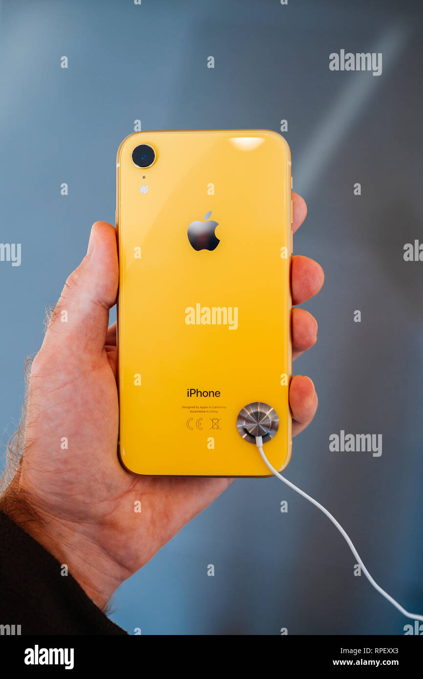Strasbourg France Oct 26 2018 Customer Holding Admiring Testing Latest Yellow Iphone Xr Smartphone In Apple Store Computers During The Launch Day Woth Apple Logo Steel Case Stock Photo Alamy