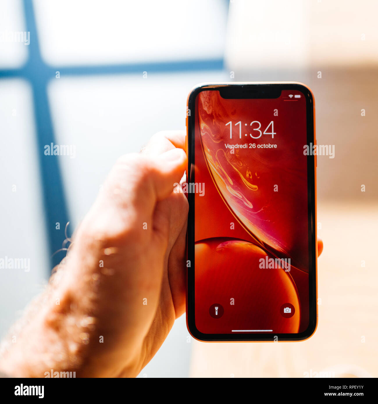 Strasbourg France Oct 26 18 Customer Pov Holding New Red Iphone Xr Smartphone During The Launch Day Admiring The Liquid Retina Display Stock Photo Alamy