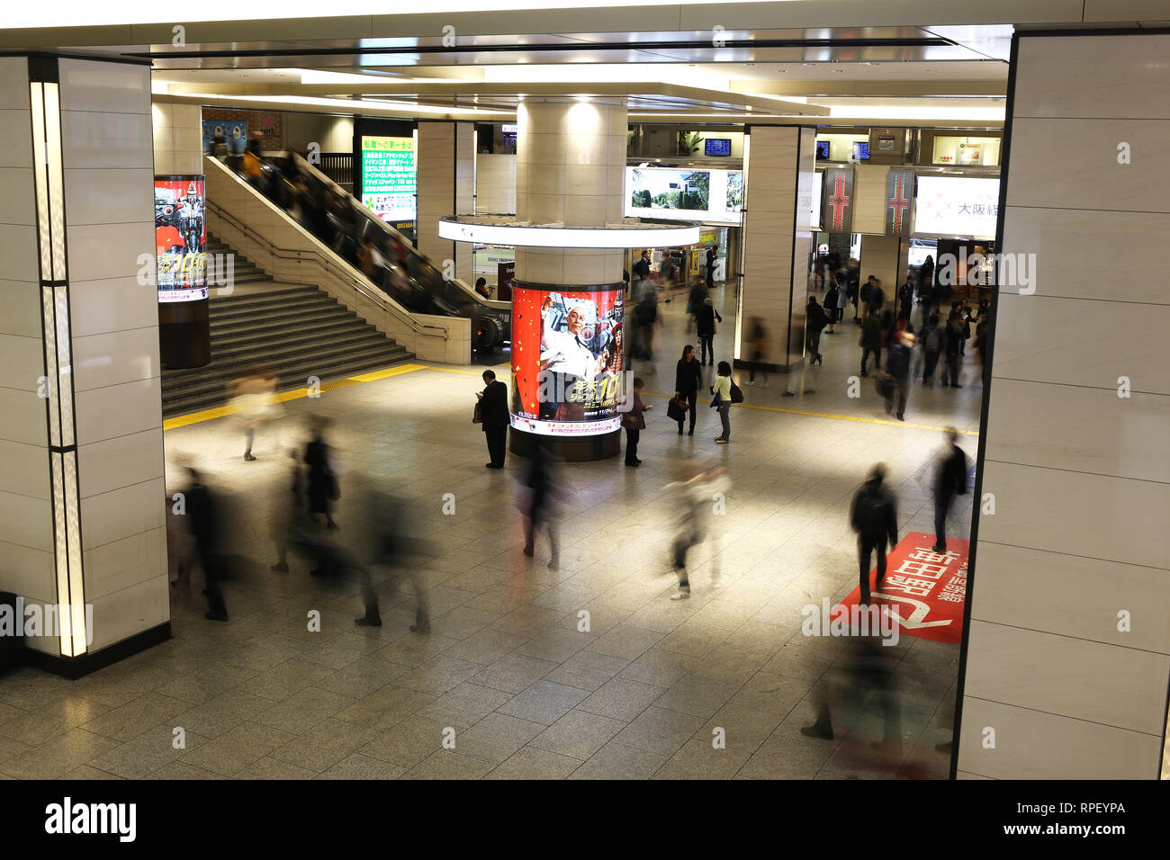OSAKA, JAPAN - DECEMBER 07, 2016: Unidentified japanese people walking though the Osaka Station in Osaka, Japan Stock Photo