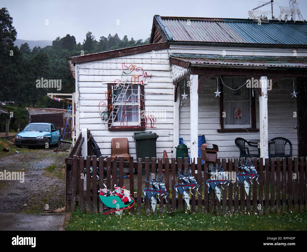 Unusual homes and houses with garden gnomes and dolls in their windows