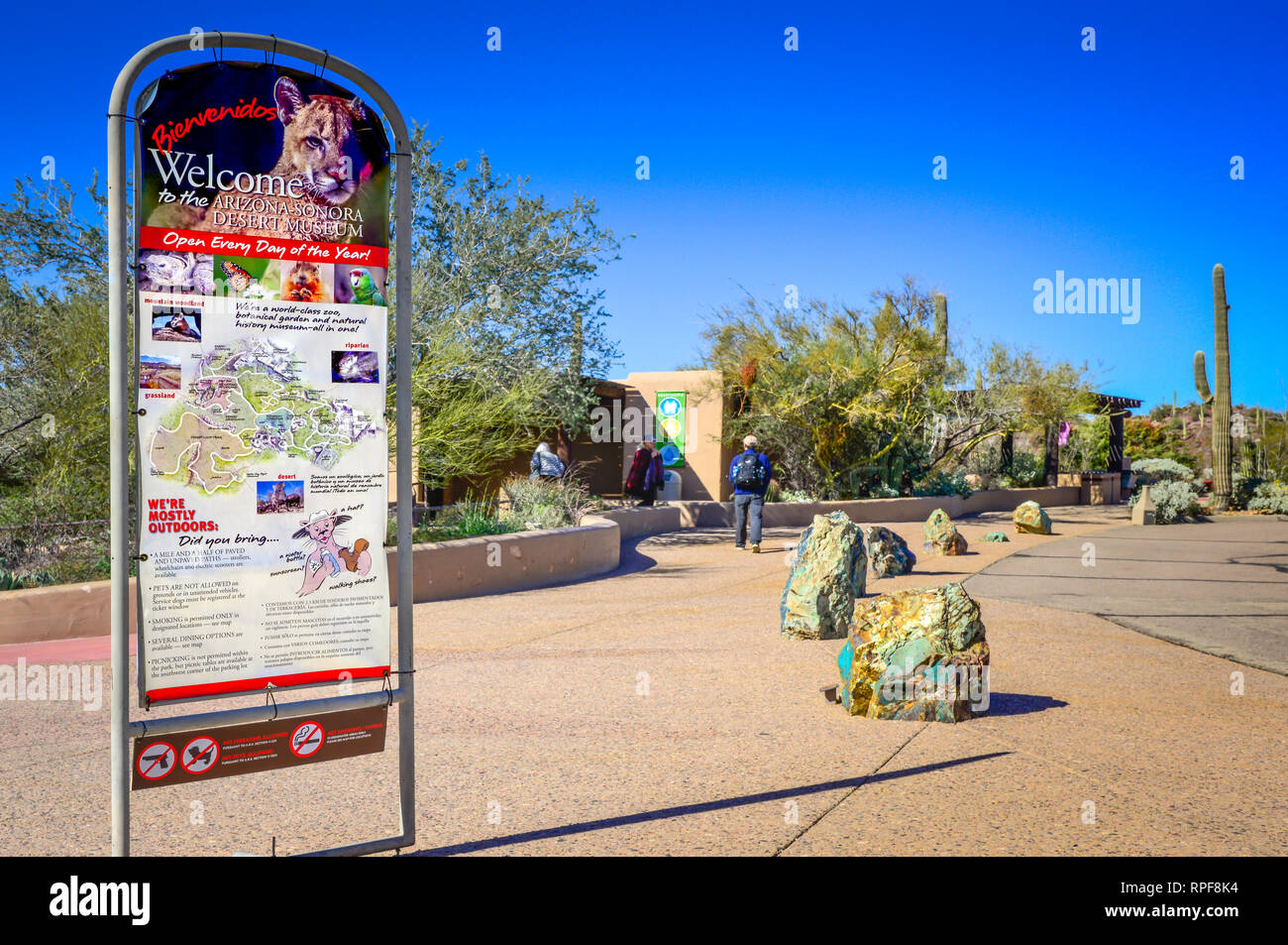 An informational signboard welcomes visitors in front of the Arizona-Sonora Desert Museum entrance in Tucson, AZ, USA Stock Photo