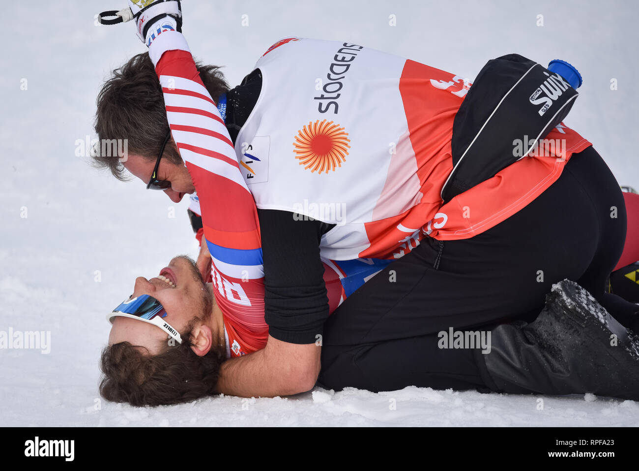 Seefeld, Austria. 21st Feb, 2019. Gleb Retivykh of Russia gets a hug from a coach at the finish line after finishing third in the men's 1.6-k freestyle sprint race at the 2019 world nordic ski championships. Credit: John Lazenby/Alamy Live News Stock Photo