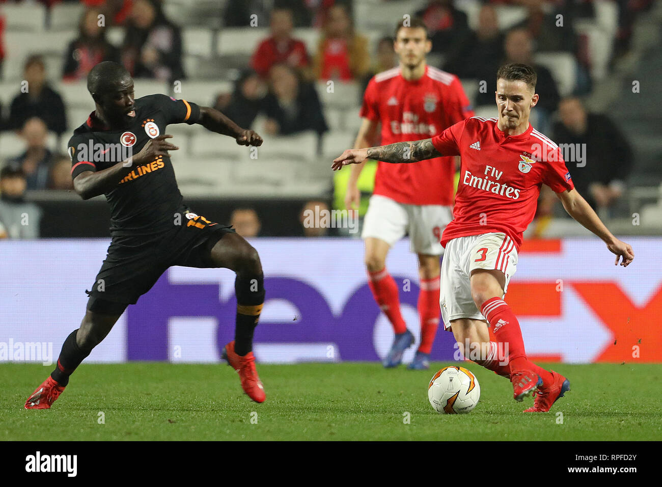 Badou Ndiaye of Galatasaray AS (L) vies for the ball with Álex Grimaldo of SL Benfica (R) during the Europa League 2018/2019 footballl match between SL Benfica vs Galatasaray AS.  (Final score: SL Benfica 0 - 0 Galatasaray AS) Stock Photo