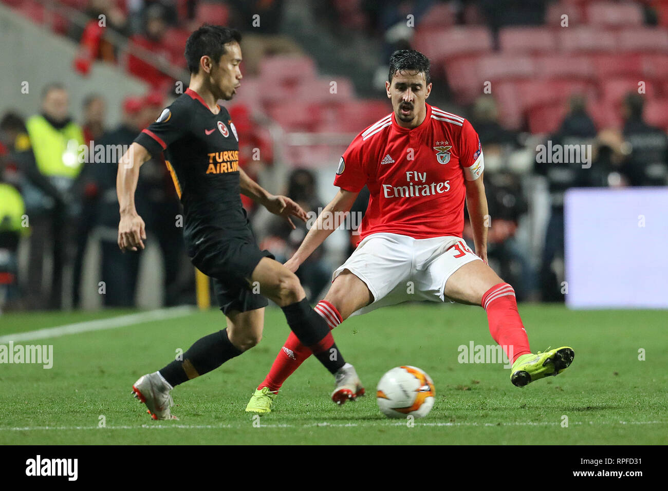 Yuto Nagatomo of Galatasaray AS (L) vies for the ball with André Almeida of SL Benfica (R) during the Europa League 2018/2019 footballl match between SL Benfica vs Galatasaray AS.  (Final score: SL Benfica 0 - 0 Galatasaray AS) Stock Photo