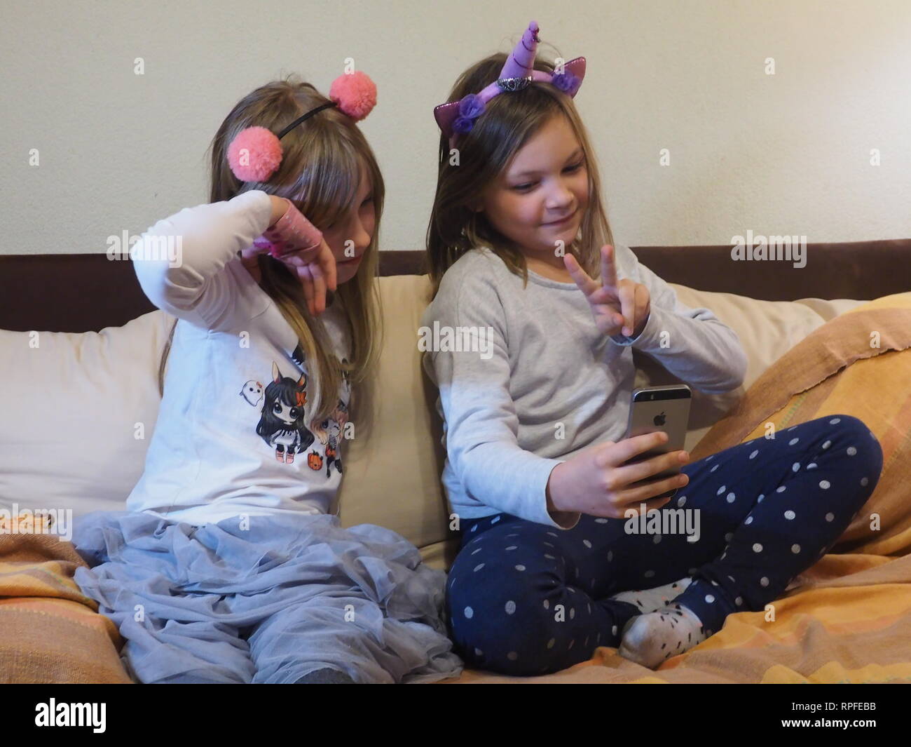 Warsaw, Poland. 16th Feb, 2019. Polish tiktokers Nadia and Zosia record a short video for Tiktok by using their parents' phone in Warsaw, Poland, Feb. 16, 2019. Credit: Shi Zhongyu/Xinhua/Alamy Live News Stock Photo