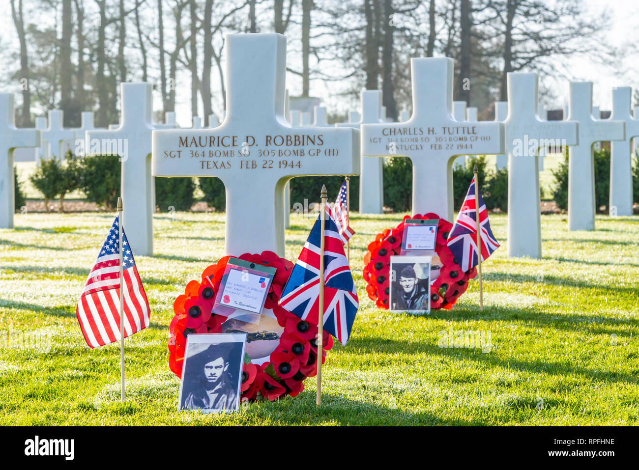 A flypast of US and RAF aircraft has been organised to fly over the crash site of B-17 bomber 'Mi Amigo' for the 75th anniversary of the event in Sheffield. The USAF F-15 fighters continued on to the Cambridge American Cemetery at which 3 of the 10 man crew are interred. Staff Sgt Harry W Estabrooks, Sgt Maurice D Robbins and Sgt Charles H Tuttle were remembered in a ceremony at the cemetery prior to the flypast.  Their inscriptions highlighted with sand from Normandy Beaches. Other 7 crew returned to US Stock Photo