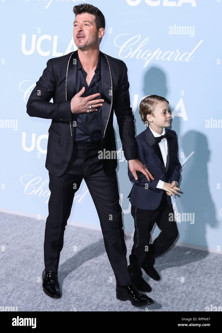 Singer Robin Thicke and son Julian Fuego Thicke arrive at the 2019