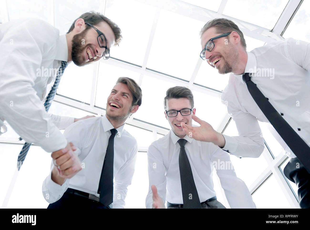 business team congratulates each other on the victory Stock Photo