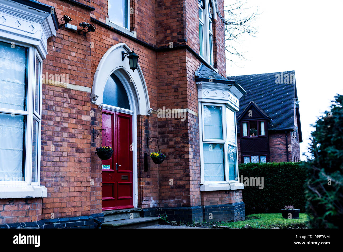 Great Britain Red Brick Houses Wooden Doors On The Brick House