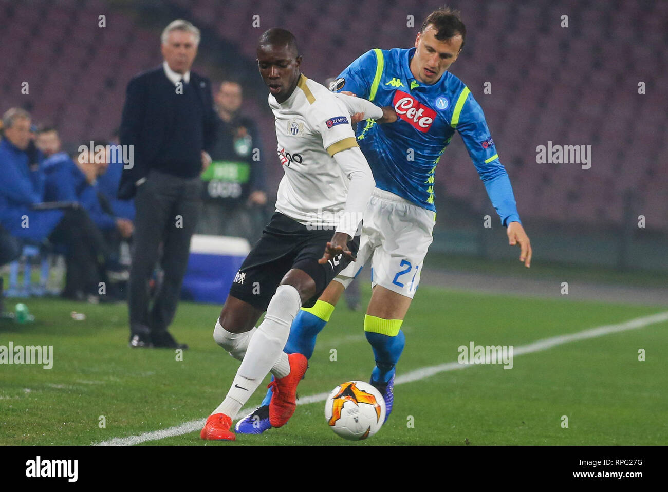 Naples, Italy. 21st Feb, 2019. Napoli, Campania, Italy, 2019-02-21, San Paolo Stadium, Europa League football match SSC Napoli - FC Zurich in pictures Vlad Chiriches defender of ssc napoli contend the ball with Assan Ceesay striker of Zurigo, the final result of the match is 2-0 for ssc napoli (Antonio Balasco - Pacific Press) Credit: Antonio Balasco/Pacific Press/Alamy Live News Stock Photo