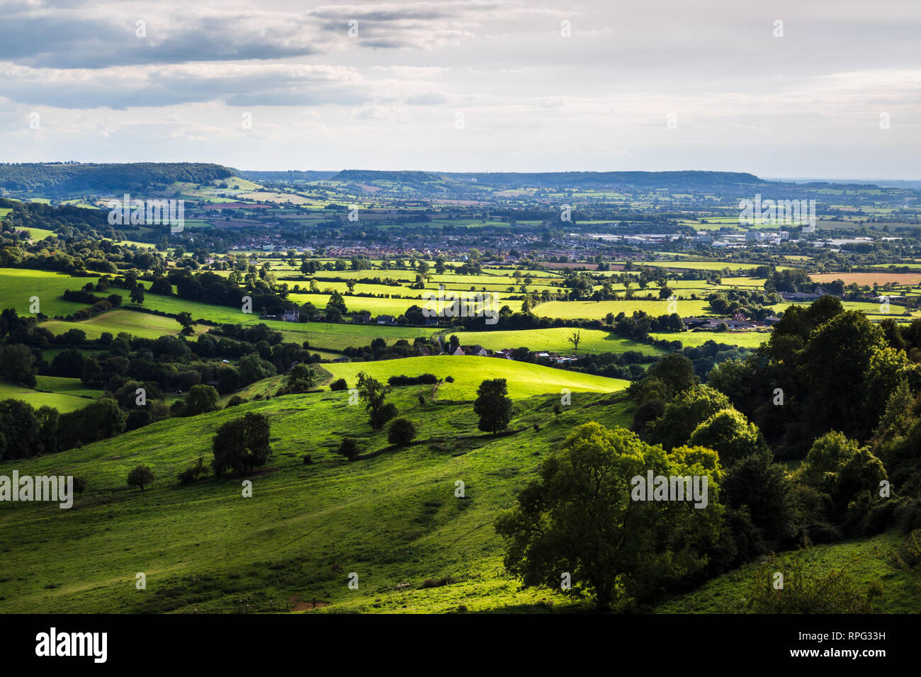 View from the vista point at the surrounding valley at British countryside on a sunny day with clouds in the sky, Haresfield Beacon, Cotswold Way, UK Stock Photo