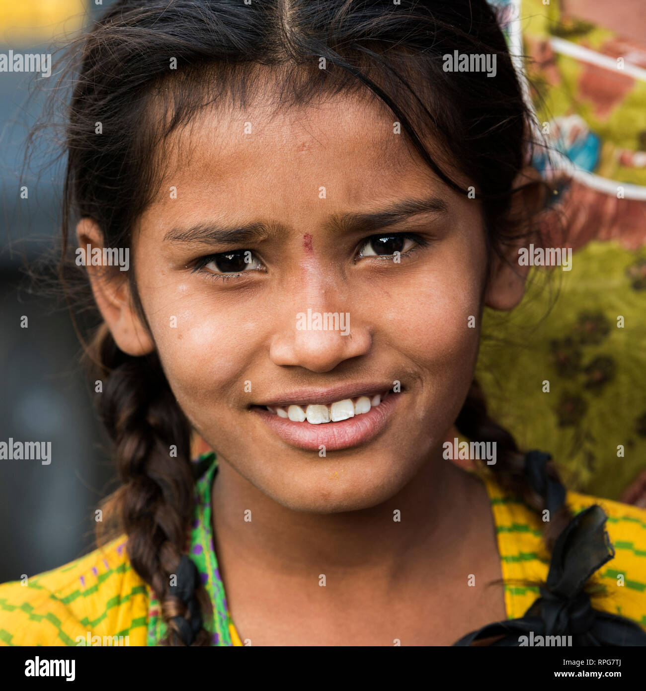 Girl child india with braids hi-res stock photography and images - Alamy