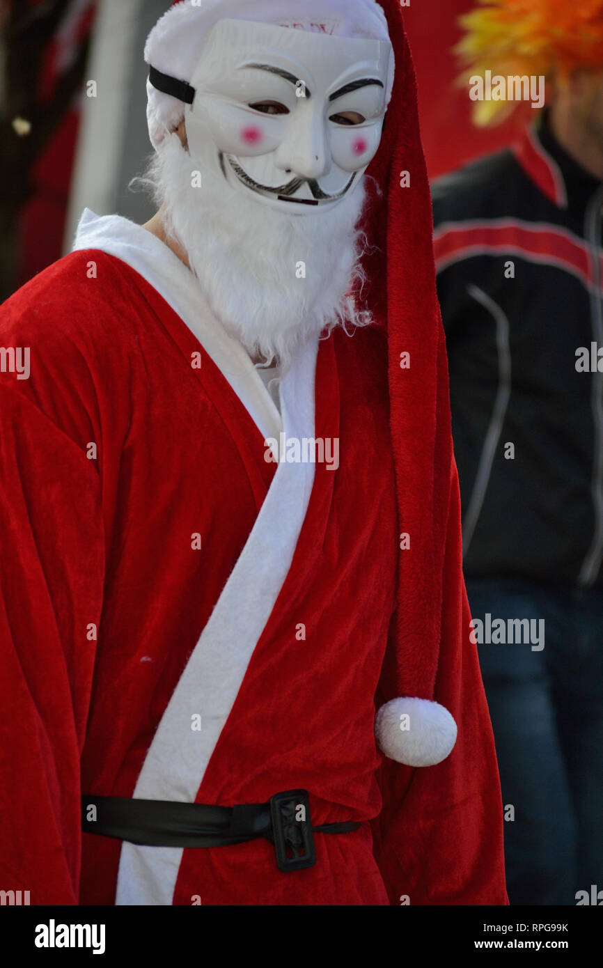 Man wearing anonymous mask hi-res stock photography and images - Alamy