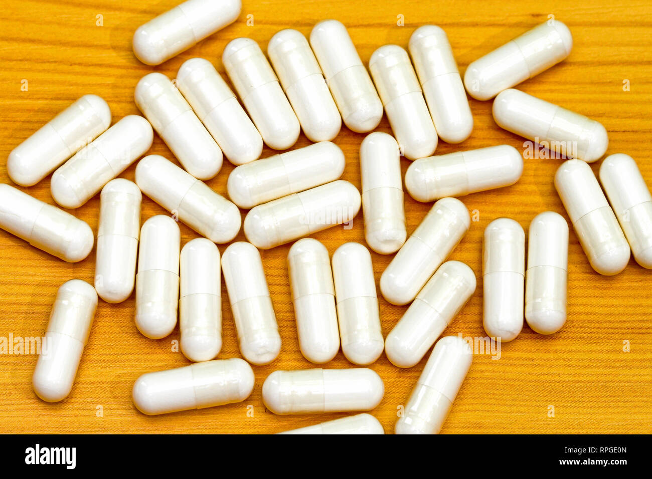 Bunch of plain white drug capsule pills Stock Photo Alamy