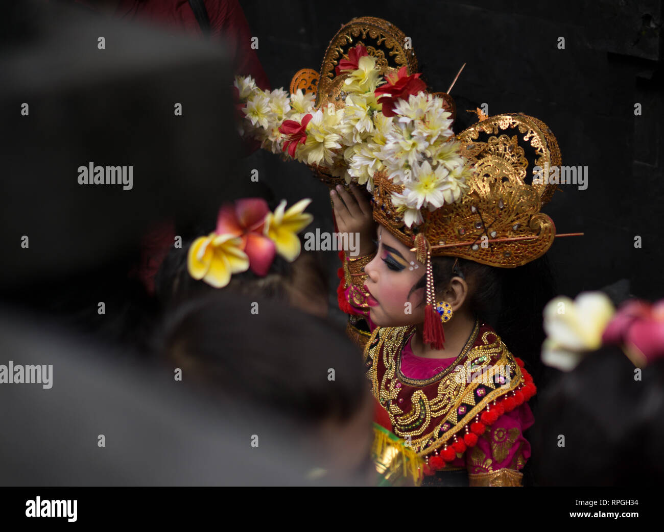 DENPASAR, BALI-DECEMBER 2017: Denpasar festival is held every year in December. Children's performance Baris dance Stock Photo