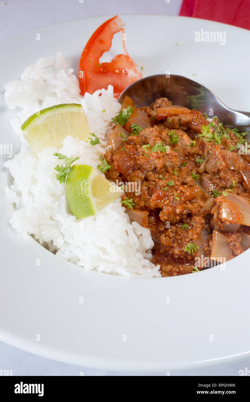 Kenyan style Quorn curry with plain boiled rice. Stock Photo