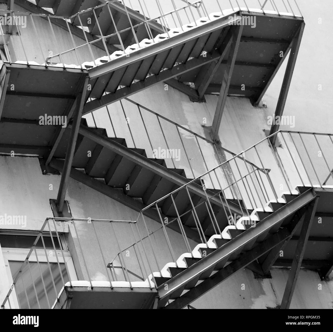 Modern house and kitchen with staircase Black and White Stock Photos ...