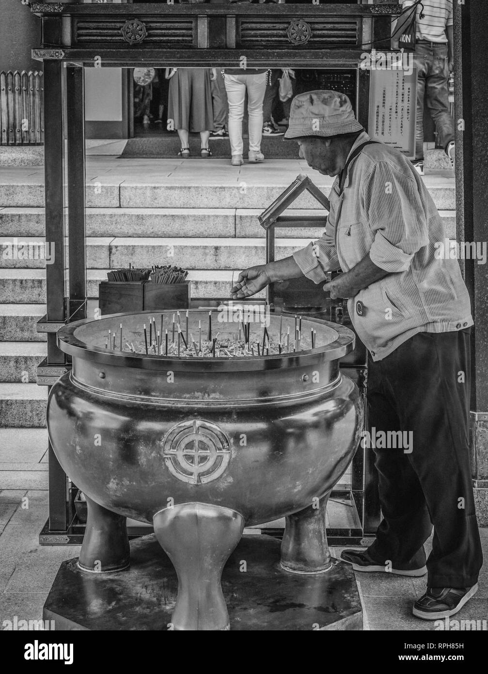 Religious incense sticks at a Japanese Temple TOKYO / JAPAN JUNE 12