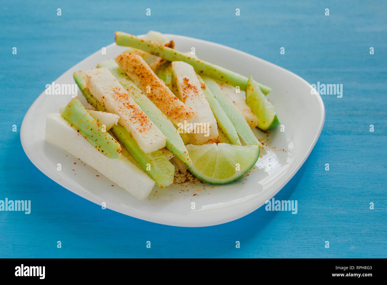 pepinos and jicama con chile, cucumber and jicamas with chili mexican