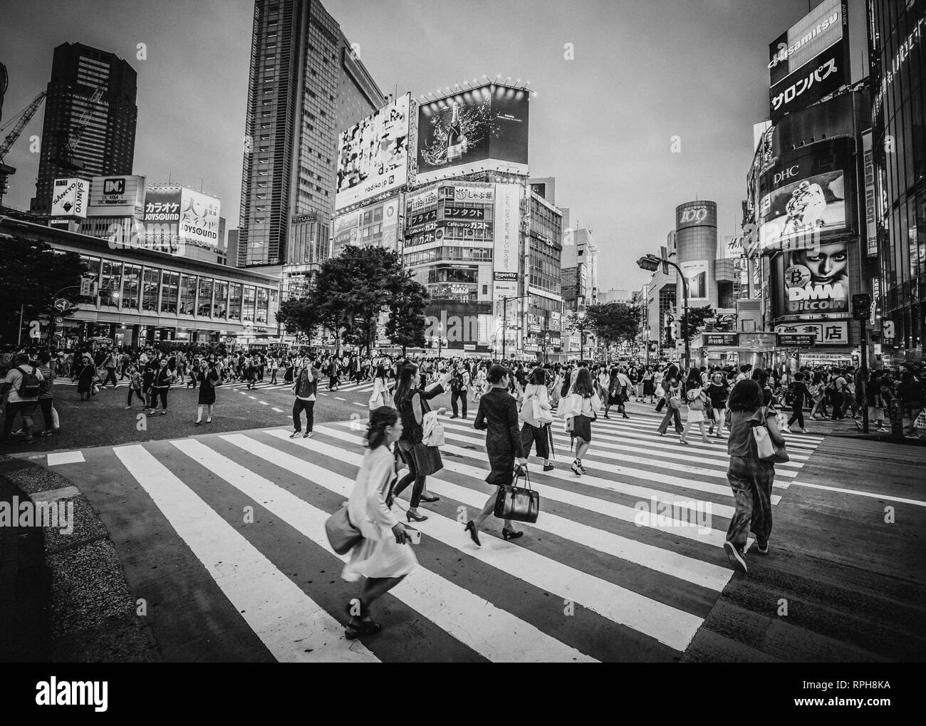 Shibuya Crossing in Tokyo - a busy place - TOKYO / JAPAN - JUNE 12, 2018 Stock Photo