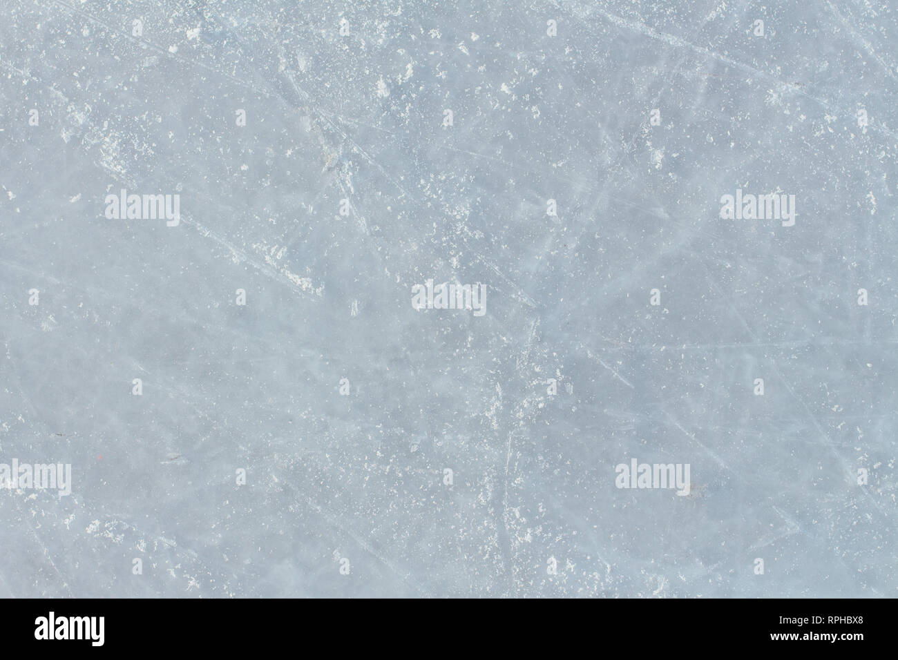 Ice background with marks from skating and hockey. Ice hockey rink ...