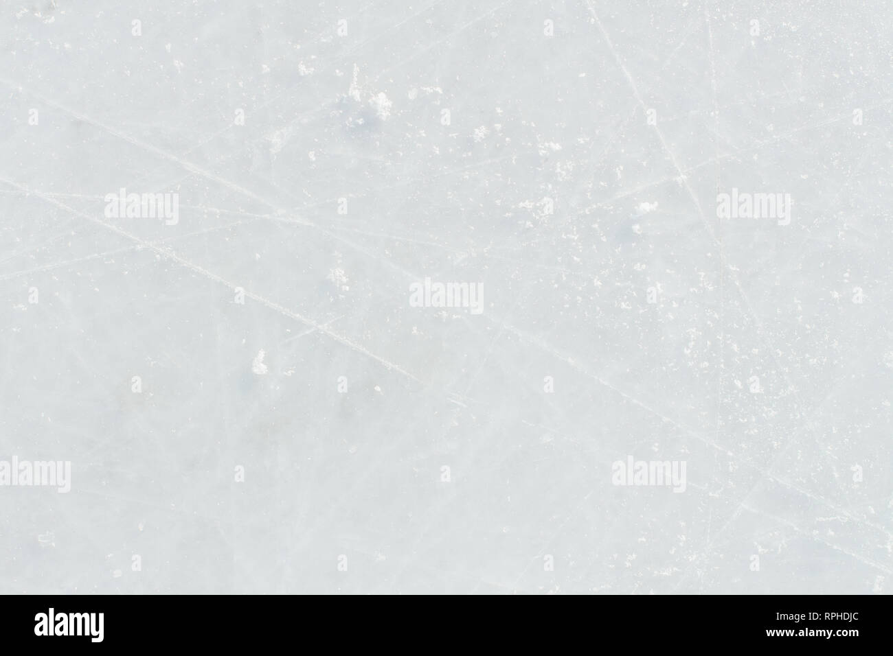Ice background with marks from skating and hockey. Ice hockey rink ...