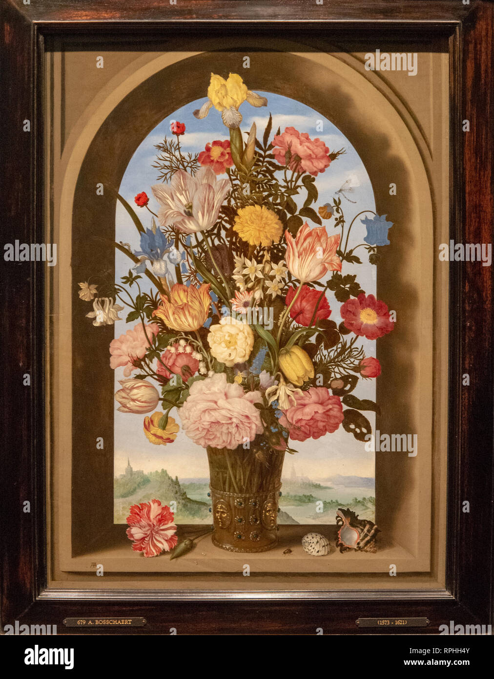 vase of flowers in a window by painter ambrosius bosschaert Stock Photo