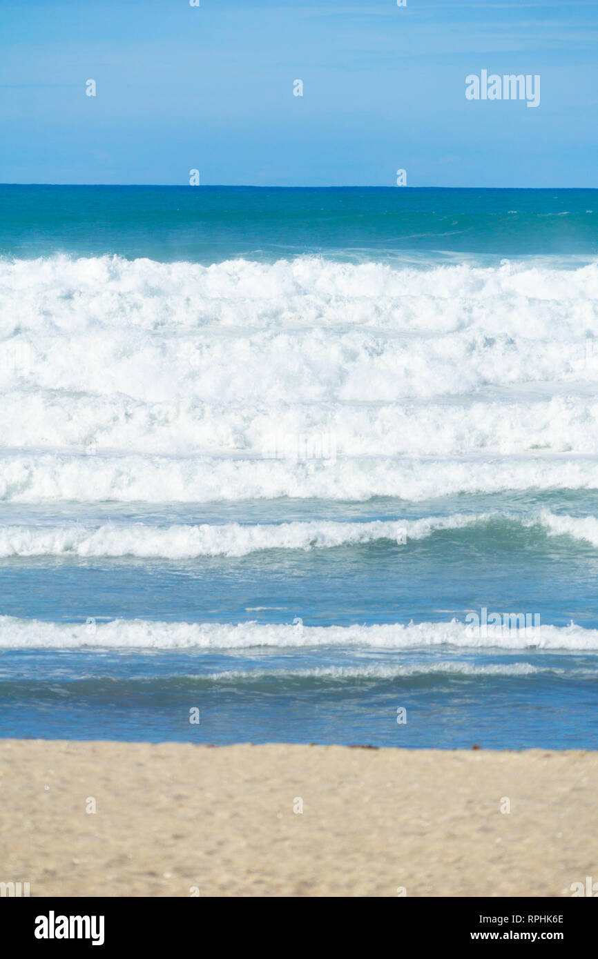 Turbulent sea at Mount Maunganui Main Beach, Tauranga New Zealand Stock