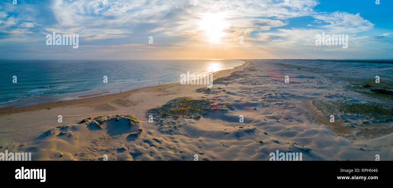 Aerial panorama of Stockton beach at sunset. Anna Bay, New South Wales, Australia Stock Photo