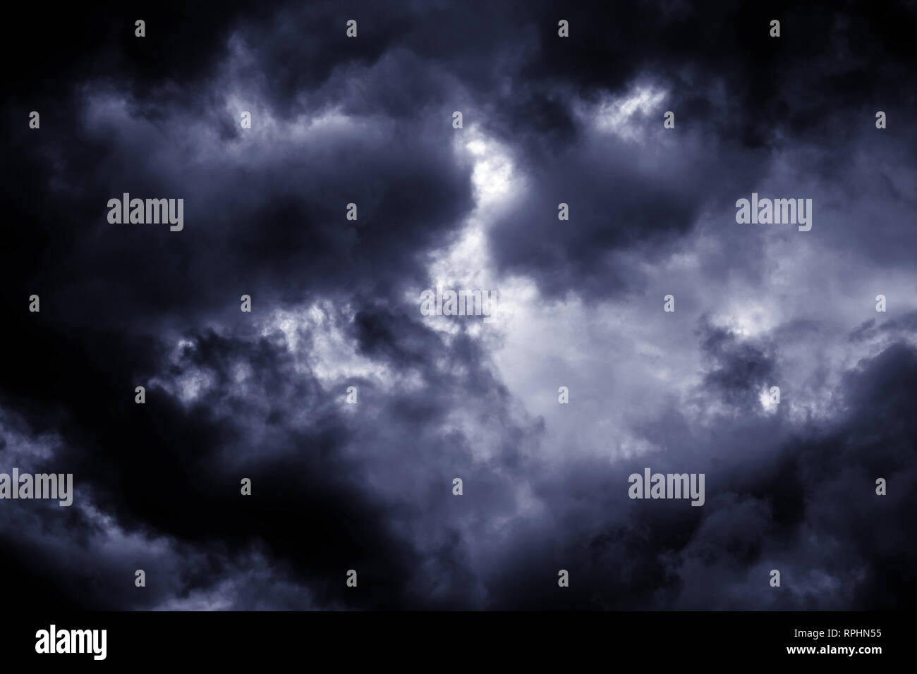 Light in the Dark and Dramatic Storm Clouds Stock Photo - Alamy