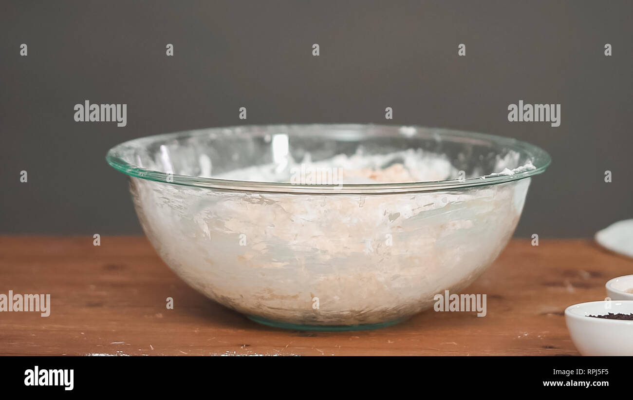 Step by step. Mixing organic ingredients in the glass bowl to bake