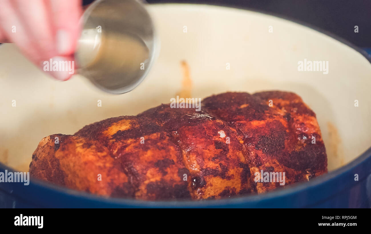 Step by step. Cooking boneless pork roast in cast iron dutch oven Stock