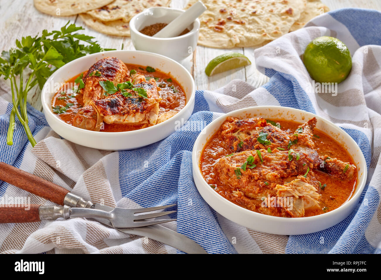 Chicken stewed in creamy spicy Coconut gravy, kuku paka, served on a