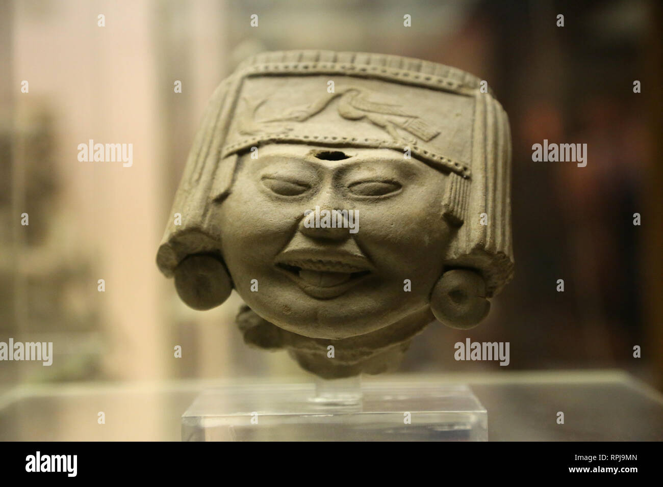 Smiling face. Vera Cruz culture. Mexico. American Museum of Natural History. New York. Unites States. Stock Photo