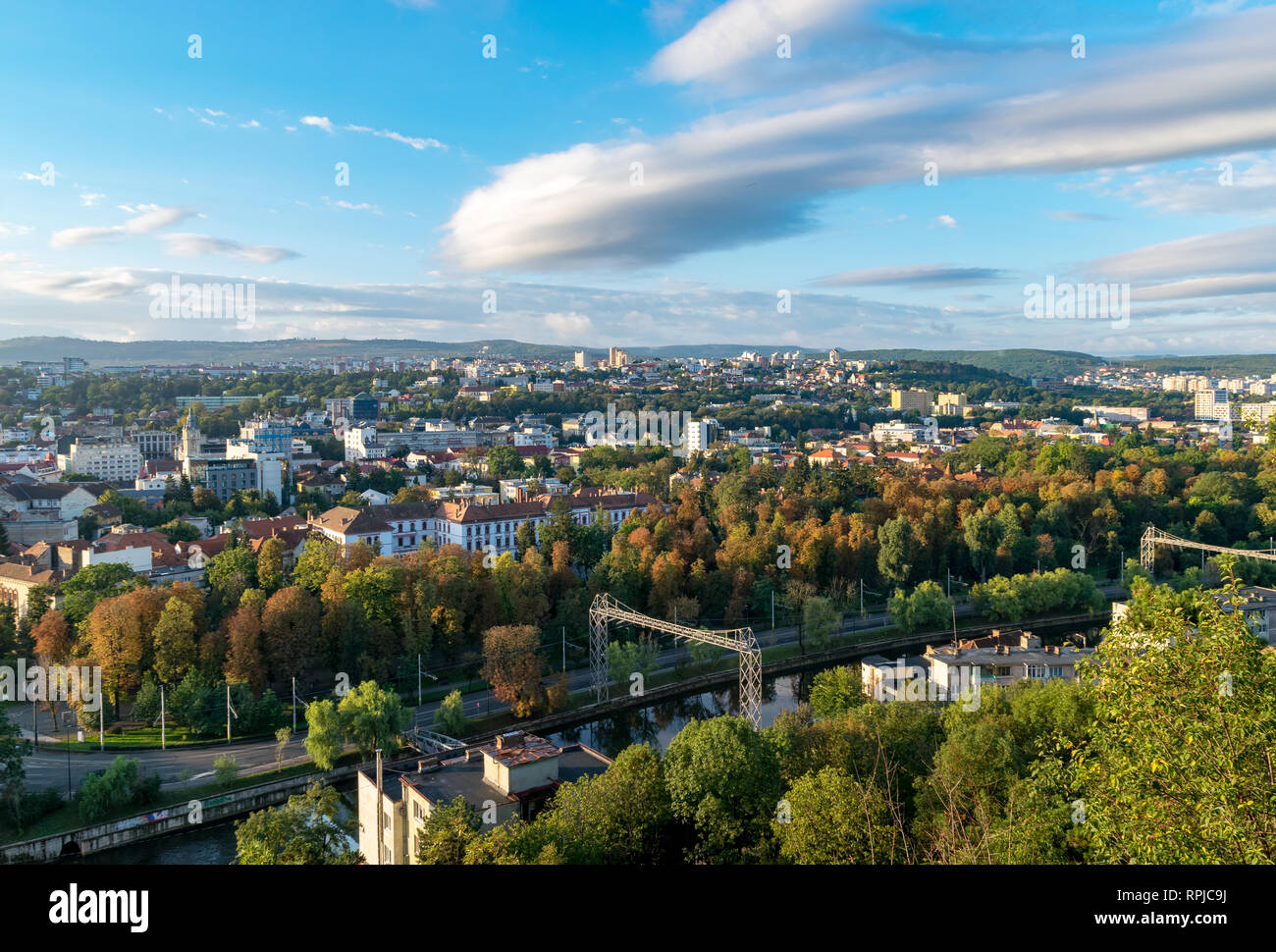 View to the Cluj-Napoca Central Park on a sunny day with blue sky from the Cetatuia Hill in Cluj-Napoca, Romania. Stock Photo