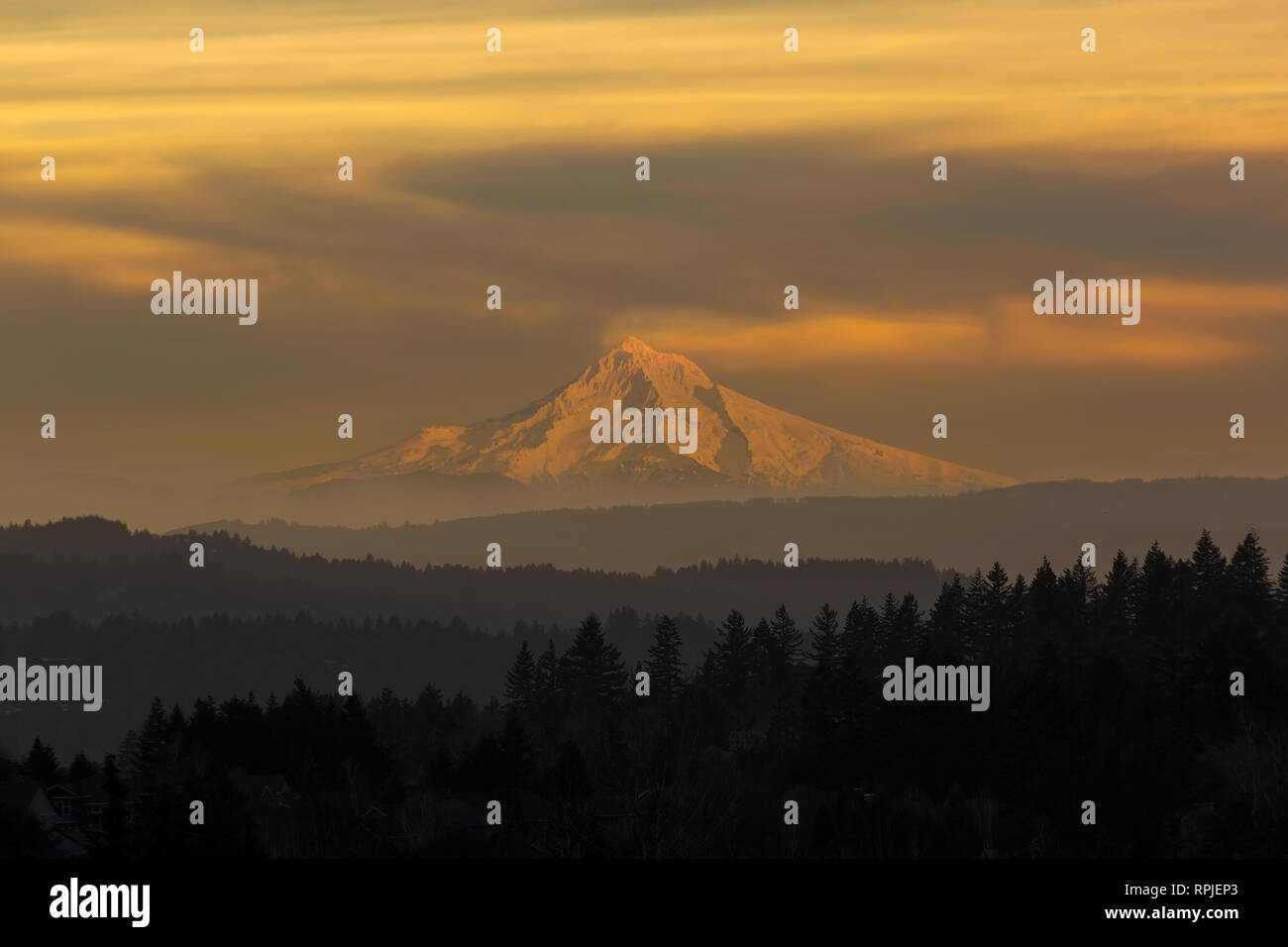 Mount Hood view from Happy Valley Oregon during a hazy sunset day in winter season Stock Photo