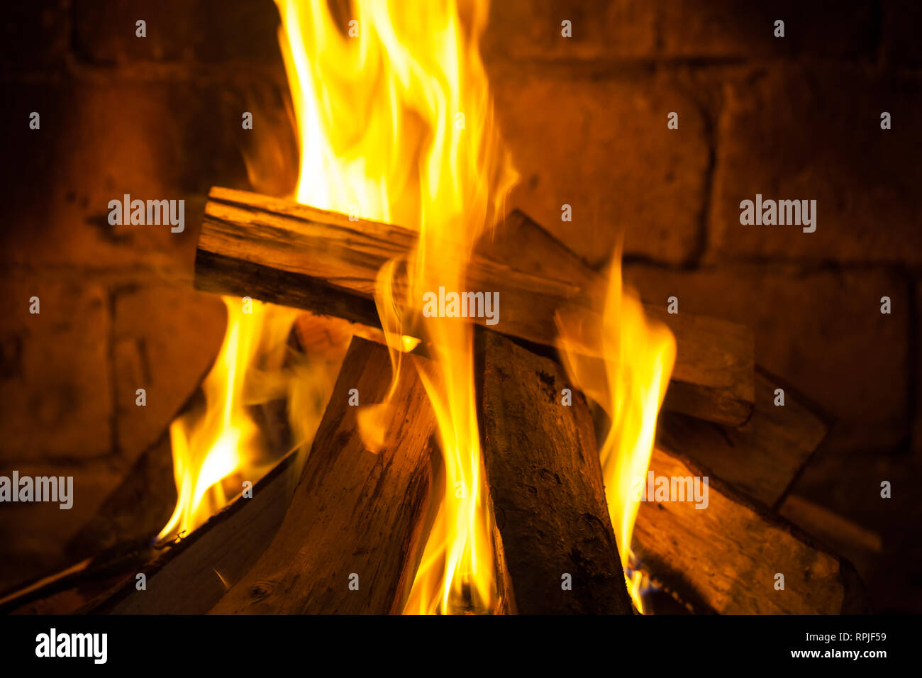 Wood Burning In A Cozy Fireplace At Home Keep Warm Stock Photo