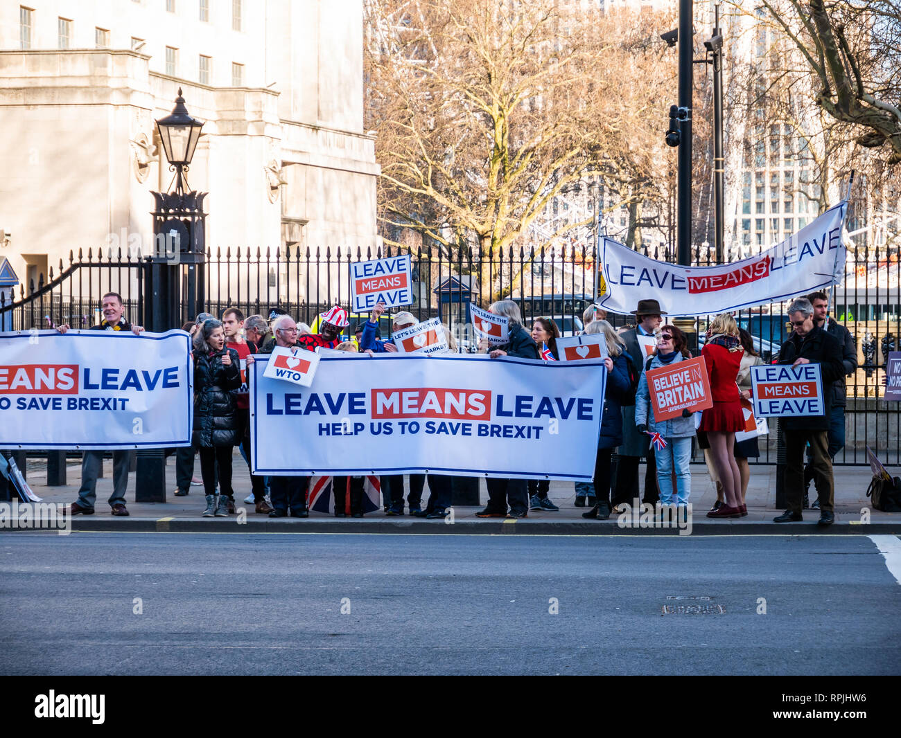 London, England - February 14, 2019: Group of people protesting in front of Parliament to support the Brexit of England out of European Union Stock Photo