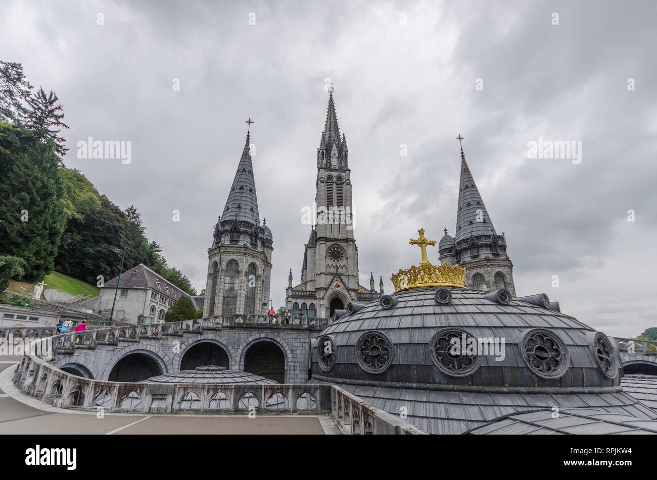 FRANCE LOURDES SEP 2018 view of basilica in Lourdes town. The town is a ...