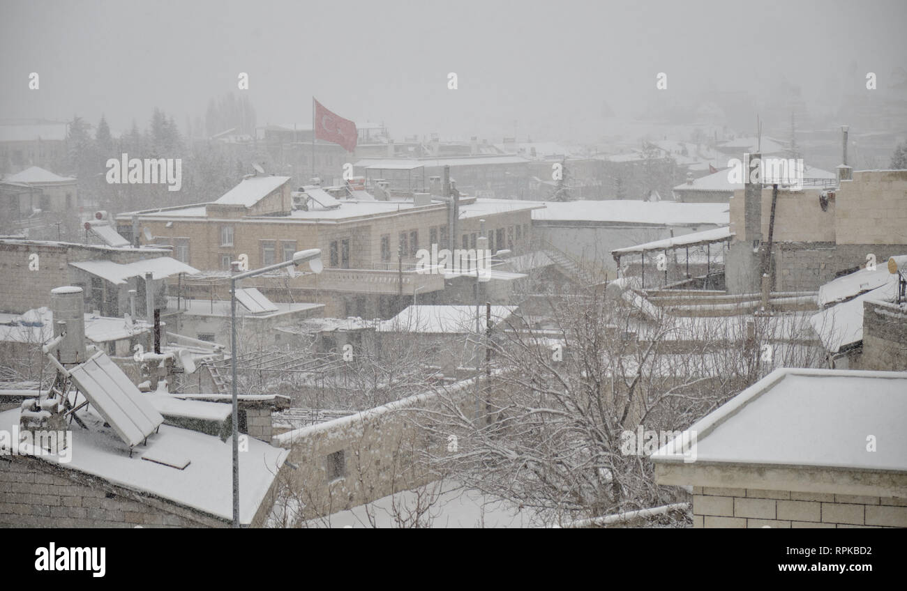 Goreme during a heavy snow fall. Everything covered in pure white snow on snowy day Stock Photo