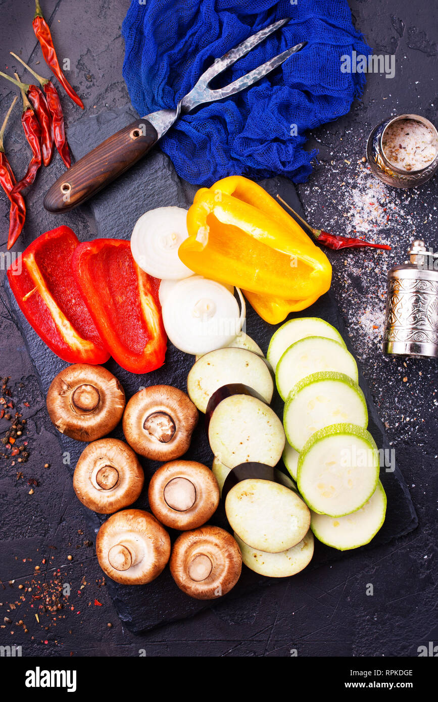 vegan food on board, mushrooms with vegetables Stock Photo - Alamy