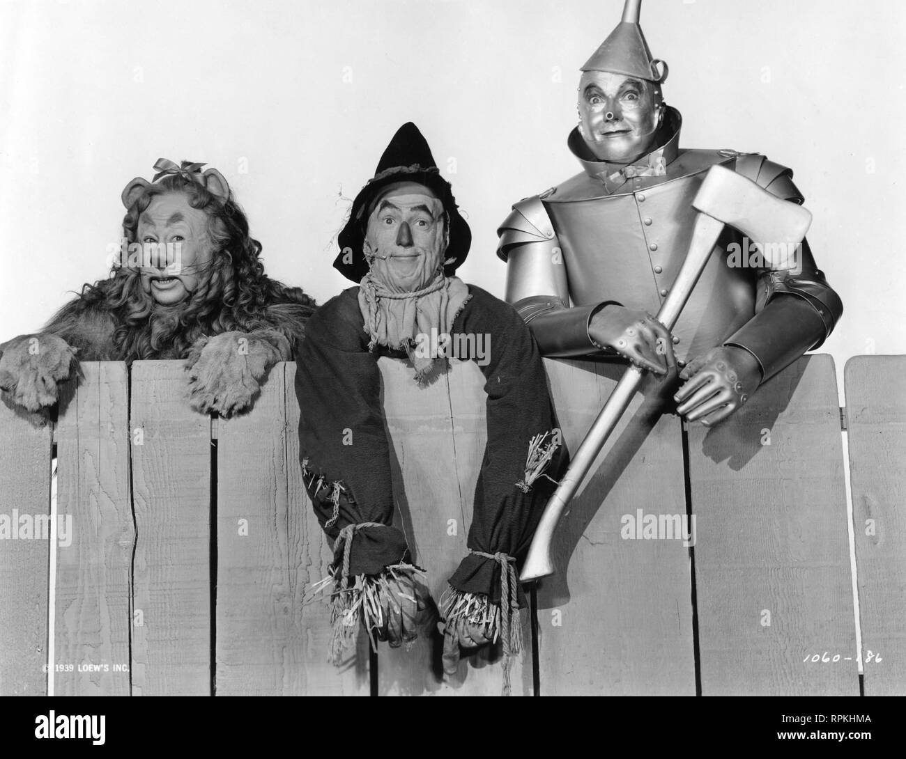 The Wizard of Oz 1939 Bert Lahr as Cowardly Lion Ray Bolger as Scarecrow  Jack Haley as Tin Man director Victor Fleming  Frank L Baum MGM Stock Photo