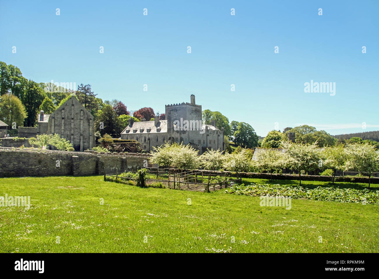 Buckland Abbey Devon once home to Sir Francis Drake house and tithe barn from a distance Stock Photo