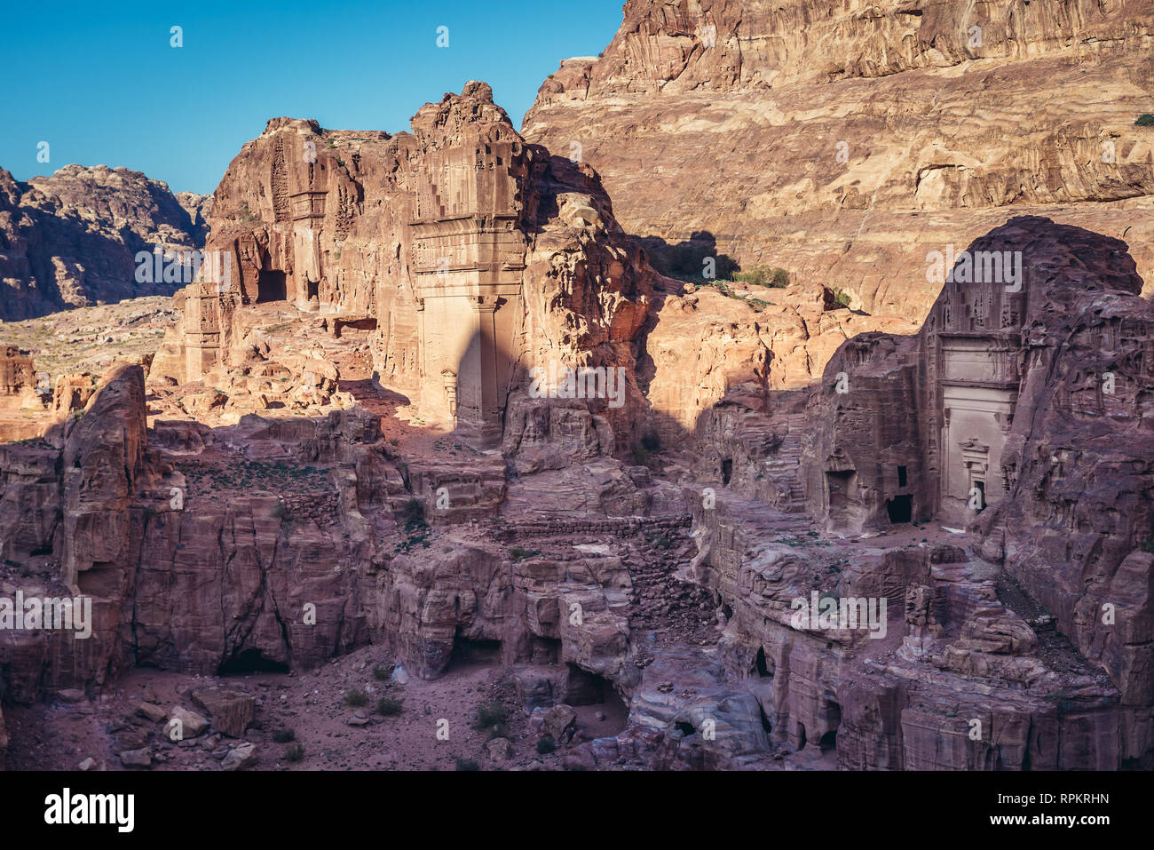 Tombs seen from Street of Facades in Petra historical city of Nabatean Kingdom in Jordan Stock Photo