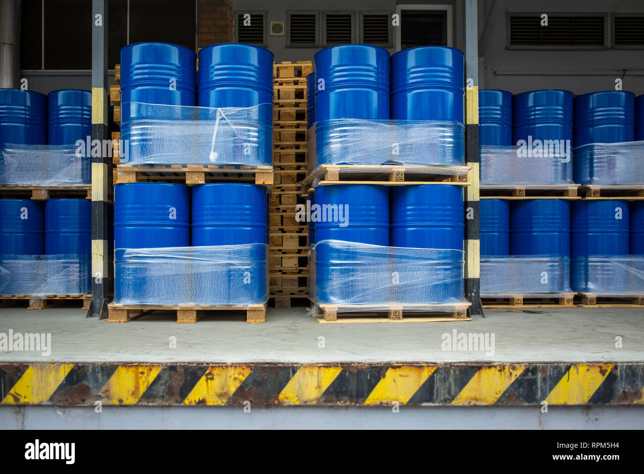 Toxic waste/chemicals stored in barrels at a plant cans with