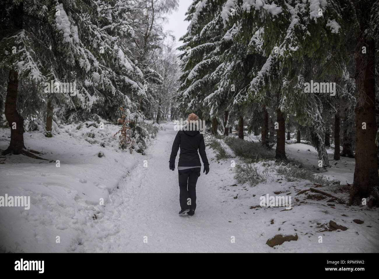 Woman in poncho winter hi-res stock photography and images - Alamy