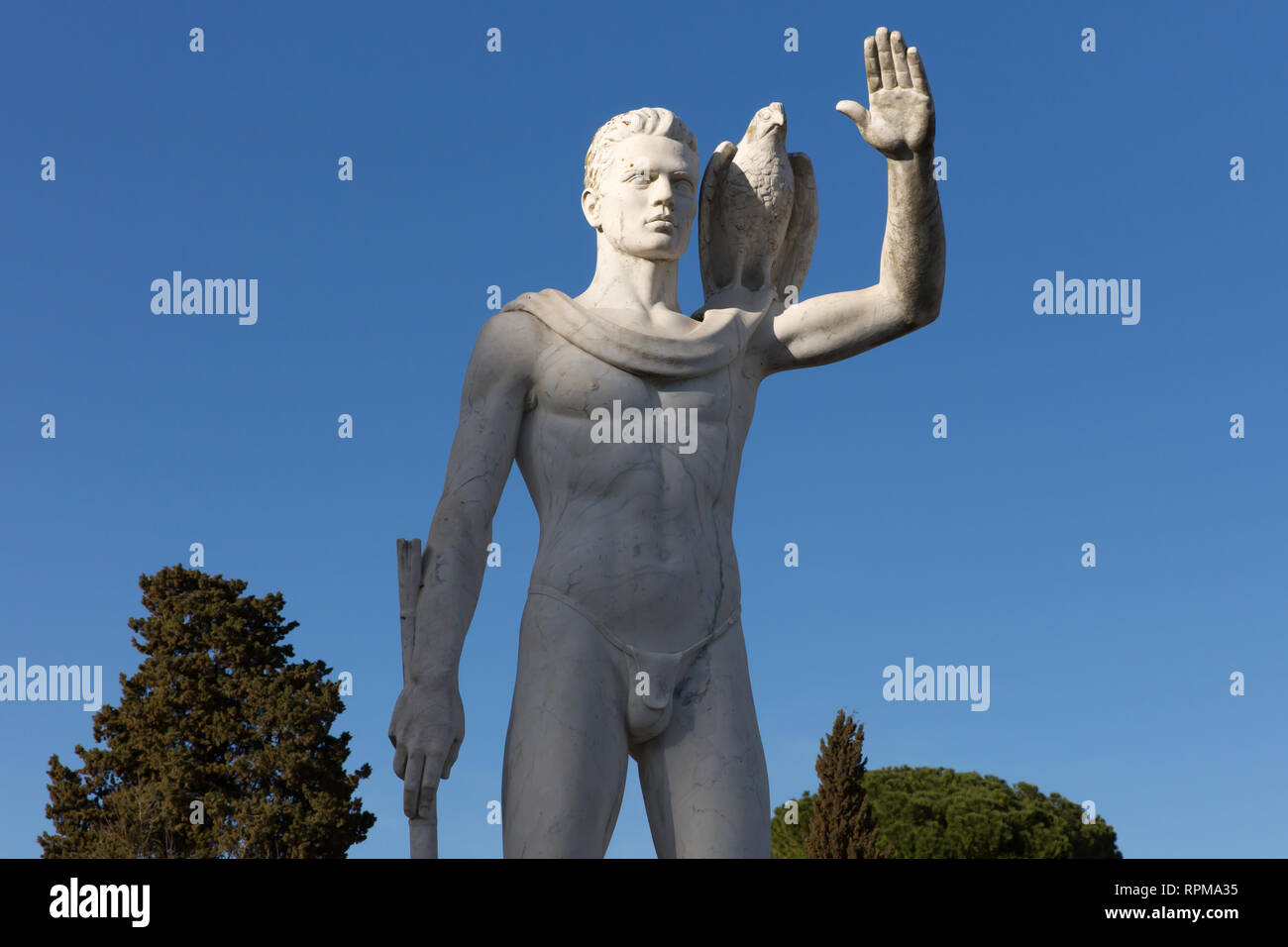ROME - Marble statue at the tennis courts to the Foro Italico. The sports complex formerly known as the Foro Mussolini was built in the fascist era. Stock Photo