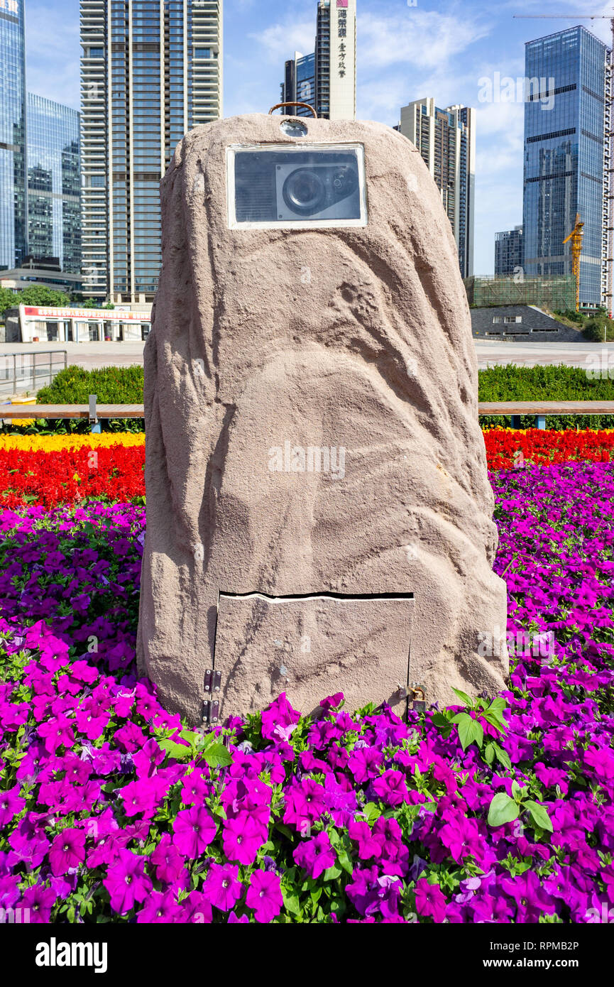 Hidden camera inside an ornamental stone at a park in Shenzhen, China Stock Photo
